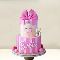 Barbie Elegance Layered Cake with beautifully crafted pink layers and elegant designs, ideal for birthday celebrations or Barbie-themed events.