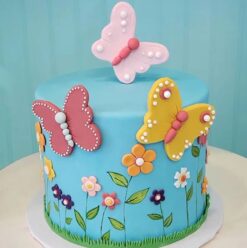 Butterfly Bliss Garden Cake featuring vibrant butterflies and colorful flowers, a whimsical design for a garden-themed celebration.