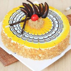 Butterscotch Choco Swirls Cake with luscious chocolate drizzles and creamy layers.