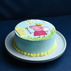 Adorable Charming Peppa Pig Cake featuring colorful fondant designs with Peppa and friends, ideal for kids' birthday parties.