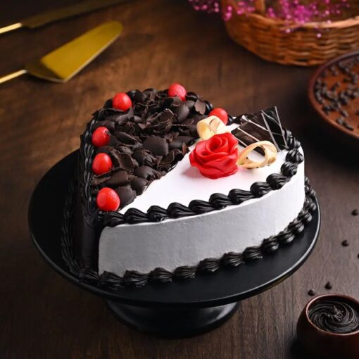 Choco Vanilla Heart Cake with layers of chocolate and vanilla, heart-shaped and adorned with elegant frosting for a romantic treat.