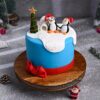 Christmas Snowyland Cake decorated with a snowy wonderland theme, complete with winter elements, perfect for festive celebrations and holiday cheer.