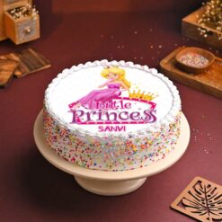 Crown Princess Cake with elegant fondant decor, regal crown topper, and exquisite design for royal-themed parties and celebrations.