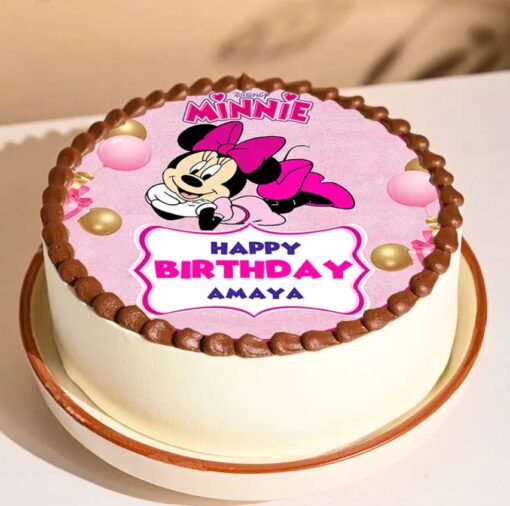 Cute Minnie Mouse Cake with vibrant decorations and playful design.