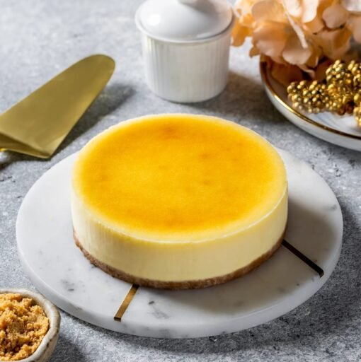 Decadent New York Cheesecake – a classic creamy dessert with a smooth texture and rich, tangy flavor.