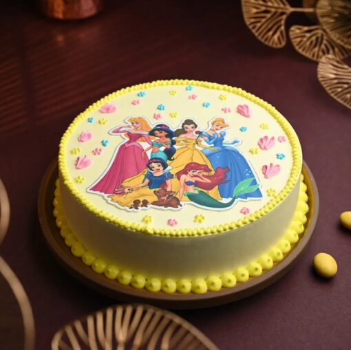 Disney Princess Cake adorned with beloved princess characters and charming fondant decorations for a fairytale-themed birthday or celebration.