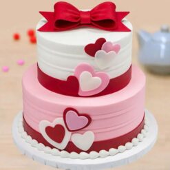 Two-Tier Fondant Cake with elegant fondant decorations, perfect for weddings, anniversaries, and other special celebrations.