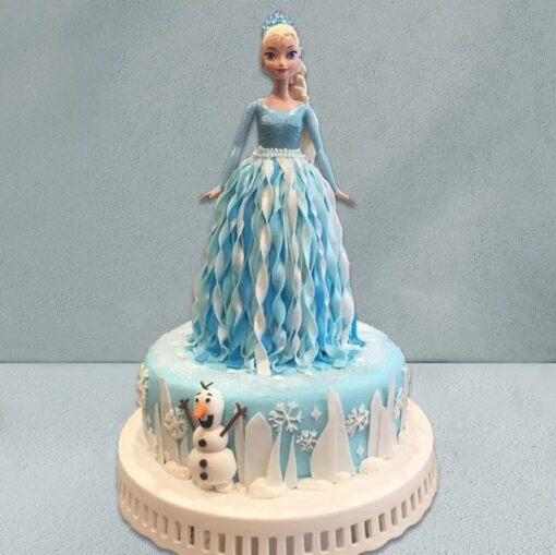 Elsa's Magic Frozen Cake with icy decorations, snowflakes, and Elsa topper, perfect for Frozen-themed events and birthdays.