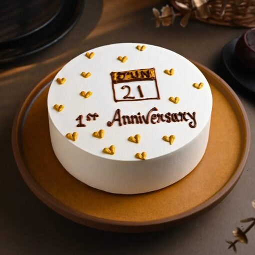 Golden Bliss Anniversary Cake, a luxurious cake perfect for celebrating milestones, featuring a rich golden design for your special day.