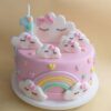 A delightful Unicorn Cake designed for a first birthday celebration, featuring vibrant colors and whimsical designs.