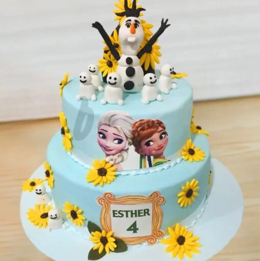 Frozen Magic Celebration Cake with icy decorations and shimmering accents, ideal for winter-themed parties or Frozen-inspired celebrations.