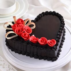 Heart Shaped Truffle Cake with rich chocolate ganache and elegant decoration, perfect for romantic celebrations or special occasions.