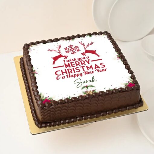 Holiday Magic Christmas Cake adorned with festive decorations like Santa, snowflakes, and holiday designs for cheerful celebrations.