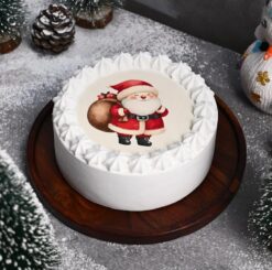 Jolly Santa Christmas Cake featuring Santa Claus and festive holiday decorations.