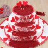 Love Red Velvet Tier Cake with luxurious red layers, creamy frosting, and romantic heart-themed decorations.