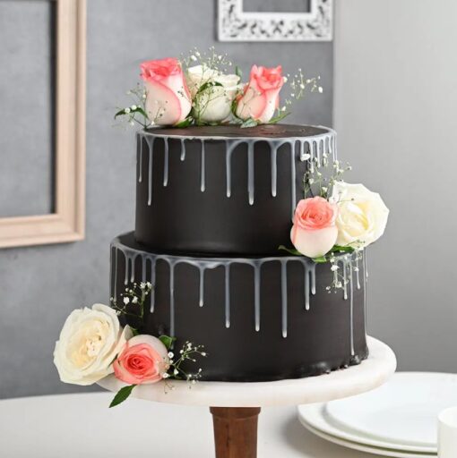 Luxurious Black Tier Cake with sleek black frosting, elegant details, and multiple tiers, perfect for stylish and sophisticated events.