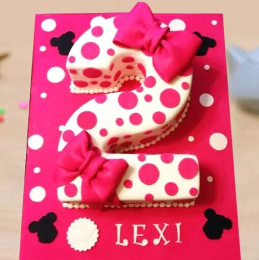 Minnie Mouse Number Cake with adorable fondant details, featuring Minnie’s bow and ears for a fun birthday celebration.