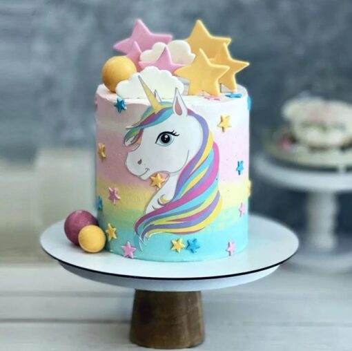 Mythical Unicorn Cake with a magical design, featuring a rainbow mane, golden horn, and pastel decorations for festive occasions.