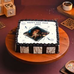 New Year Memories Photo Cake with personalized photo and festive decorations, offering a delicious treat for New Year's celebrations.