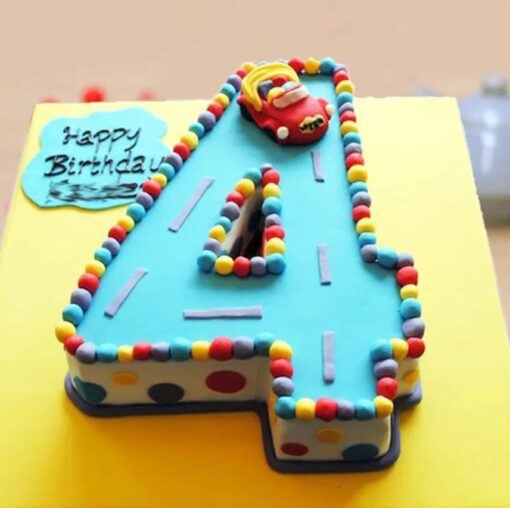 Colorful Number Four Birthday Cake featuring fun designs for a child’s 4th birthday celebration.