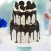 Oreo Tiered Cake with creamy layers, chocolate cake, and Oreo cookie decorations.