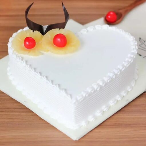 Heart Shaped Pineapple Cake with a delightful pineapple flavor, perfect for celebrations like anniversaries, Valentine's Day, or special occasions.