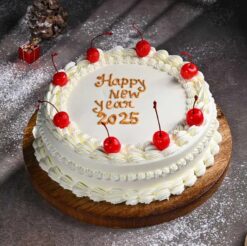 Pineapple New Year Cake with tropical flavors and festive decorations.