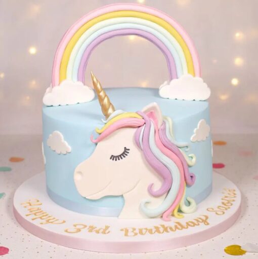 Rainbow Dreams Unicorn Cake with vibrant layers, whimsical unicorn decor, and a magical design perfect for birthdays and celebrations.