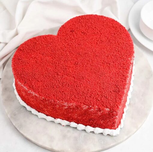 Red Heart Silk Cake showcasing smooth red velvet layers, creamy frosting, and elegant silk-like finish, perfect for romantic celebrations.