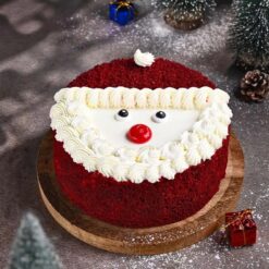 Red Velvet Santa Cake with layers of rich red velvet, adorned with Santa designs and festive holiday decorations.