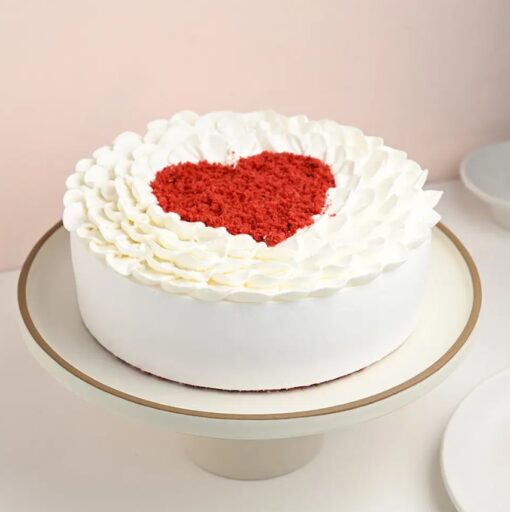 Scarlet Silk Love Cake featuring rich red velvet layers, silky smooth frosting, and elegant heart-themed decorations.