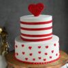 Love Valentine Tier Cake with layered design, elegant decorations, and romantic touches, perfect for a Valentine’s Day celebration.