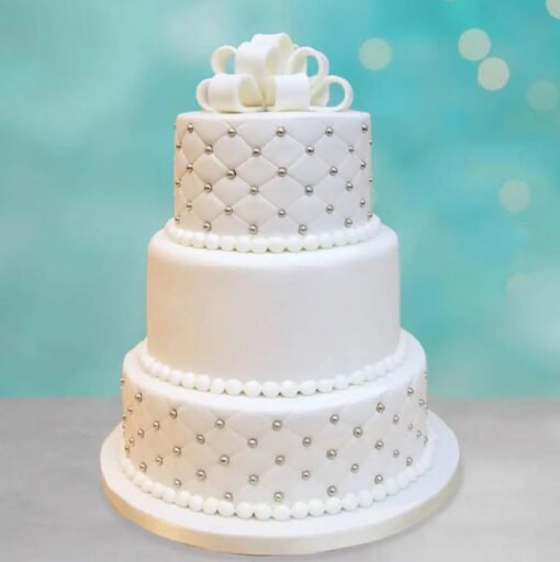 Three Tier Wedding Cake with elegant designs, personalized decorations, and premium flavors for an unforgettable wedding celebration centerpiece.