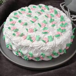 Strawberry Petal Charm Cake – a beautifully adorned cake featuring delicate strawberry petals, perfect for romantic and elegant celebrations.