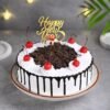 Sweet New Year Black Forest Cake – a delightful Black Forest cake with chocolate layers, whipped cream, and cherries for New Year celebrations.