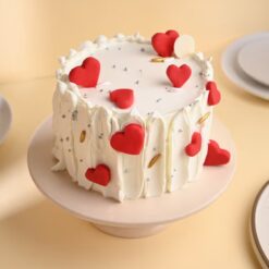 Sweetheart Red Velvet Cake – a luscious red velvet cake topped with creamy frosting, ideal for romantic and special occasions.