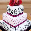 Three Tier Celebration Cake with exquisite decoration and layers of delicious flavors for special events.