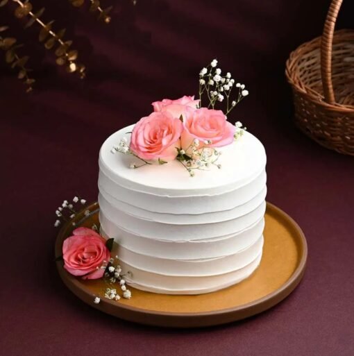 Vanilla Rose Bliss Cake featuring soft vanilla layers and aromatic rose flavors.