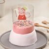 Peppa Pig Pull Up Cake with cascading frosting reveal, featuring Peppa Pig decorations and vibrant colors.