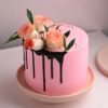 Romantic Pink Roses Cake with delicate pink rose decorations and smooth frosting.