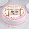 White & Pink Photo Cake with a custom edible photo topper, pink floral decorations, and smooth frosting, perfect for celebrations.