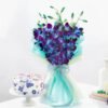 Azure Romance Orchids Combo featuring exquisite blue orchids paired with delightful treats—ideal for romantic surprises and special occasions.