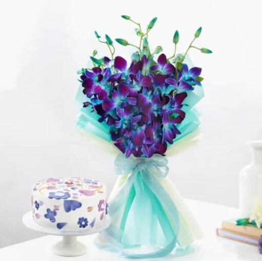 Azure Romance Orchids Combo featuring exquisite blue orchids paired with delightful treats—ideal for romantic surprises and special occasions.