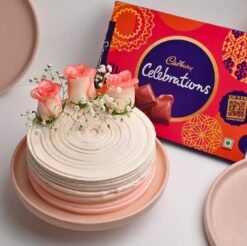 Bloom Cake With Cadbury Delight – A beautifully decorated cake with blooming floral designs, paired with rich Cadbury chocolates for a sweet treat.