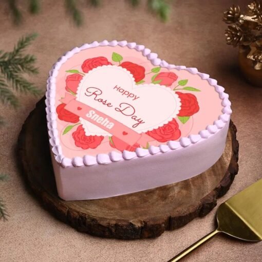 Sweet Rose Day Cake adorned with delicate rose decorations and a soft cake texture.