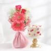 Charming Blooms & Cake featuring a beautiful bouquet of fresh flowers paired with a delectable cake, ideal for any special occasion.