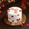 A charming Cuddle Me Teddy Day Cake featuring a cute teddy bear design, perfect for a heartfelt celebration.