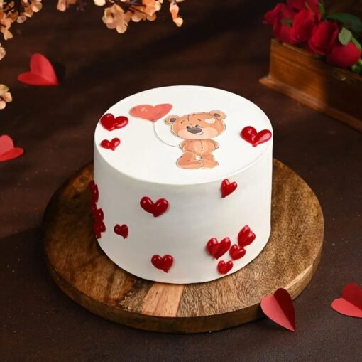 A charming Cuddle Me Teddy Day Cake featuring a cute teddy bear design, perfect for a heartfelt celebration.