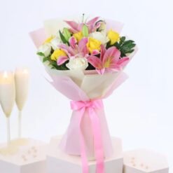 Divine Lily Harmony bouquet featuring fresh, fragrant lilies, elegantly arranged for a timeless floral gift.