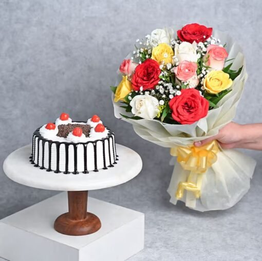 Elegant bouquet of fresh roses with a delightful cake, making an ideal gift for birthdays, anniversaries, and romantic surprises.